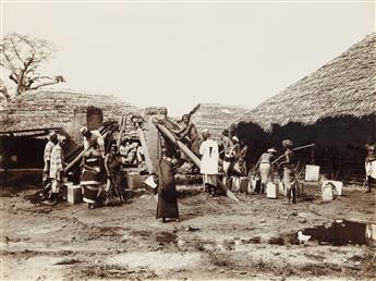 (MOMBASA, KENYA) Album with 24 rare and accomplished photographs by Wm. D. Young chronicling the impact of British colonialism on the i